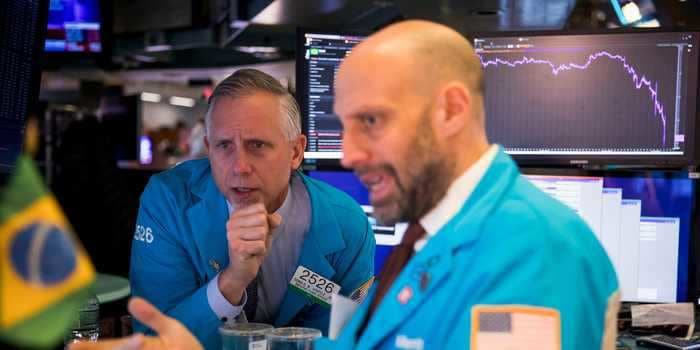 US stocks pull back from record highs as Wall Street's rally cools