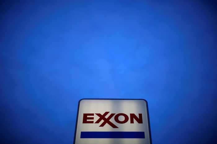 A fumbled layoff hurt morale at Exxon, and it could hinder the oil giant's recovery