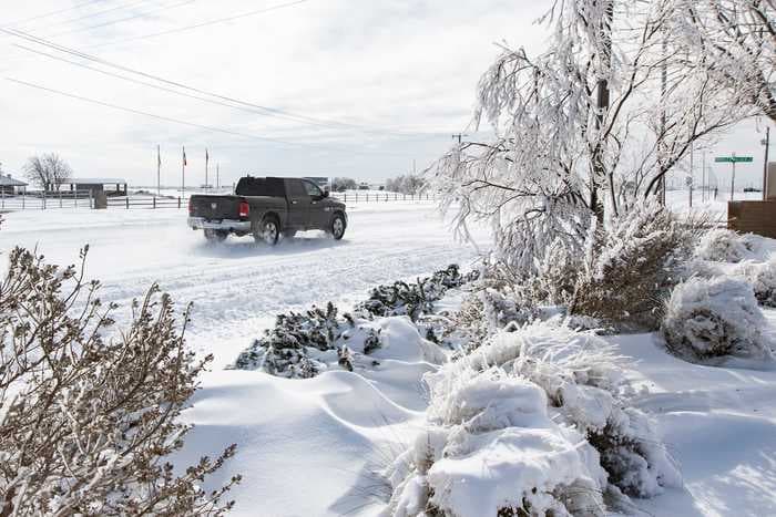 2 dead in Texas storm that plunged the state below freezing and cut off power to emergency warming shelters