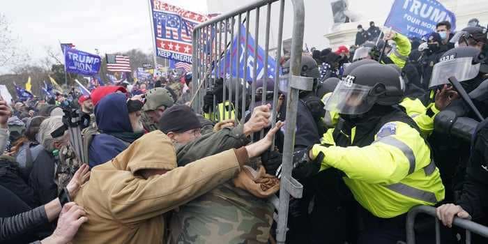 Ex-NYPD officer charged with using a flagpole to assault a cop during the US Capitol riot