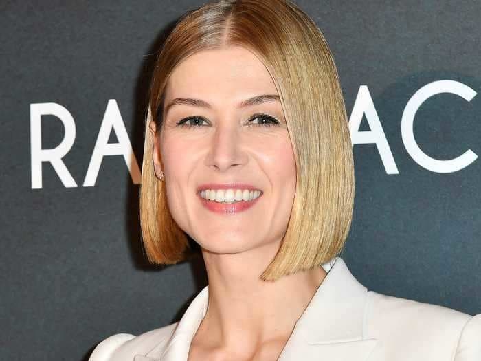 Rosamund Pike says movie posters have been edited to make her chest look bigger without her prior consent