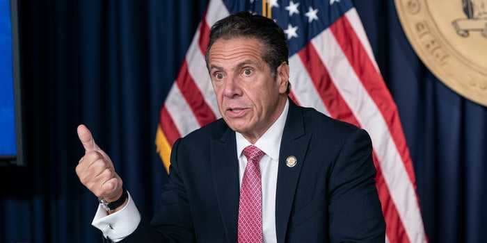 Cuomo says kissing and hugging people is his 'usual and customary way of greeting' but apologizes 'if they were offended by it'