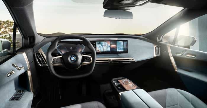 The future of BMW interiors is this massive touchscreen that can tell who's speaking to it - see more