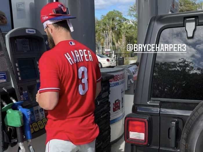 Phillies star Bryce Harper looked like a little leaguer at a gas station in full uniform