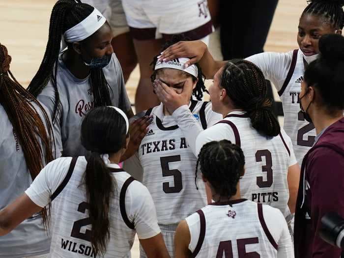 A breakout March Madness star teared up over 'trust' from her teammates after hitting overtime buzzer beater