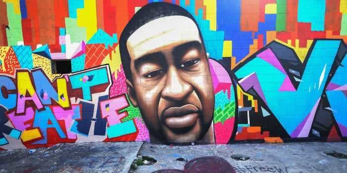 A George Floyd mural in Houston was defaced with a racial slur