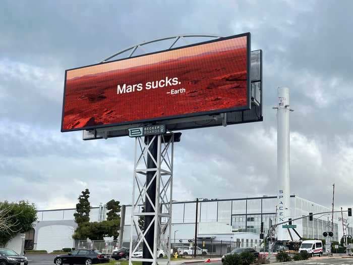 A billboard outside of SpaceX headquarters targeted Elon Musk's plans for planet colonization on Earth Day: 'Mars sucks'