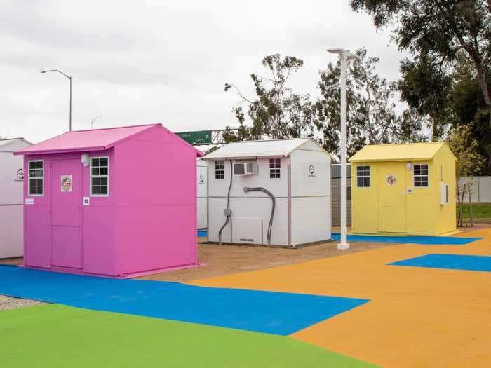 LA just debuted a new $8.6 million prefab tiny home village to help solve the city's homelessness crisis- see inside