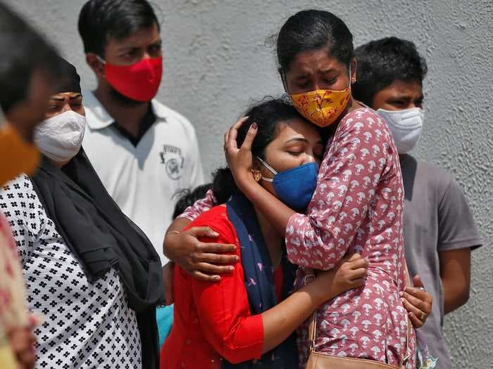 India's COVID-19 death toll reaches a grim milestone with a new record of more than 4,000 deaths reported on Saturday