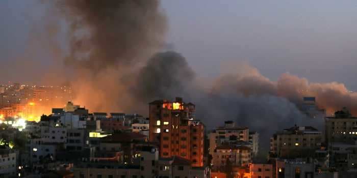 A Gaza residential tower collapsed and an Israeli bus was struck by rocket fire as violence escalates: reports