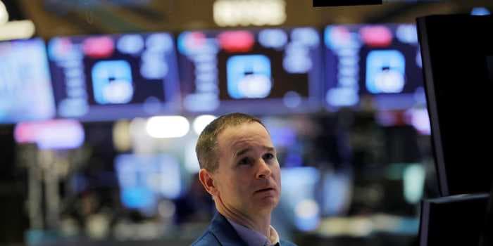 Dow slides 165 points in turbulent trading investors digest mounting inflation and Fed minutes