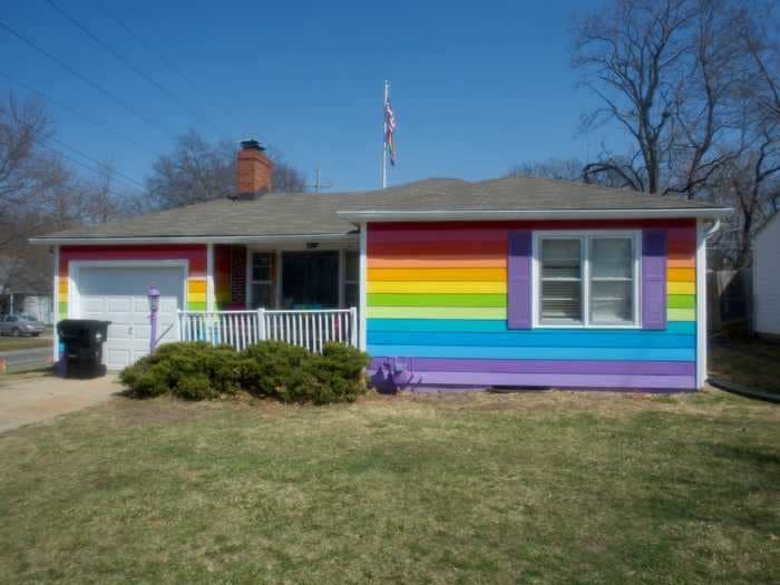 A man bought a home right across the street from a homophobic church and painted it the colors of the Pride flag
