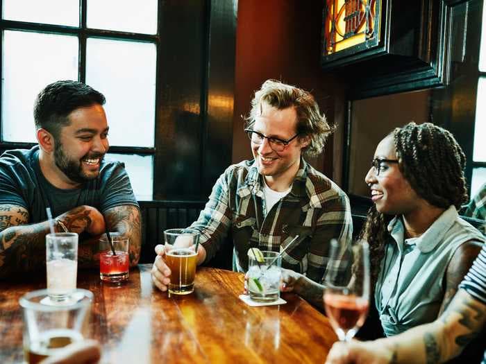 4 ways to avoid a hangover if happy hour drinks go awry and you're out of practice, according to experts