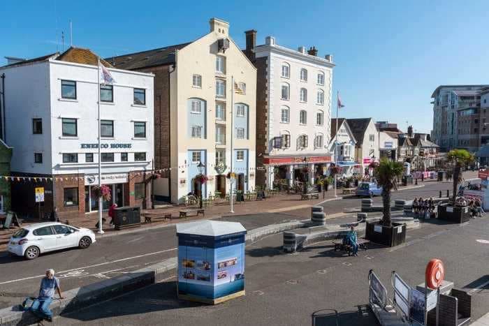 Ten retailers in a British coastal town are operating rent-free for 2 years, with no strings attached, as part of a plan to rescue the UK's 'high streets'