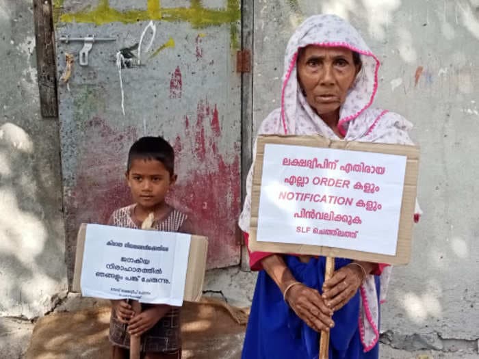 Pics of underwater protests from a small Indian island, which is fighting its local administration