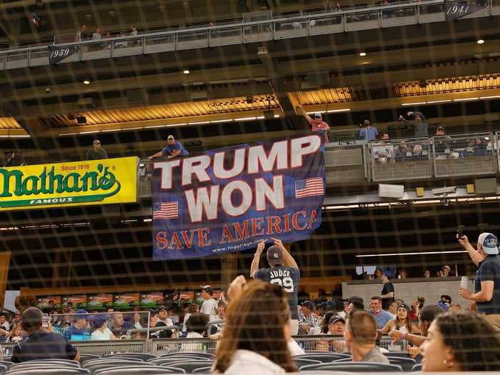 A man keeps unfurling 'Trump Won' banners at MLB ballparks, but he hasn't been arrested