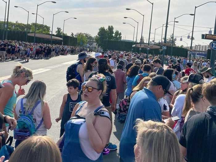 Disneyland is back at full capacity. Photos show maskless crowds filling the park for the first time in over a year.