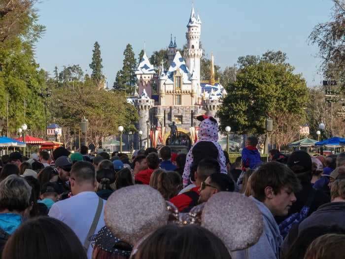 Videos show hordes of people lined up for blocks to get into Disneyland after it dropped its mask mandate