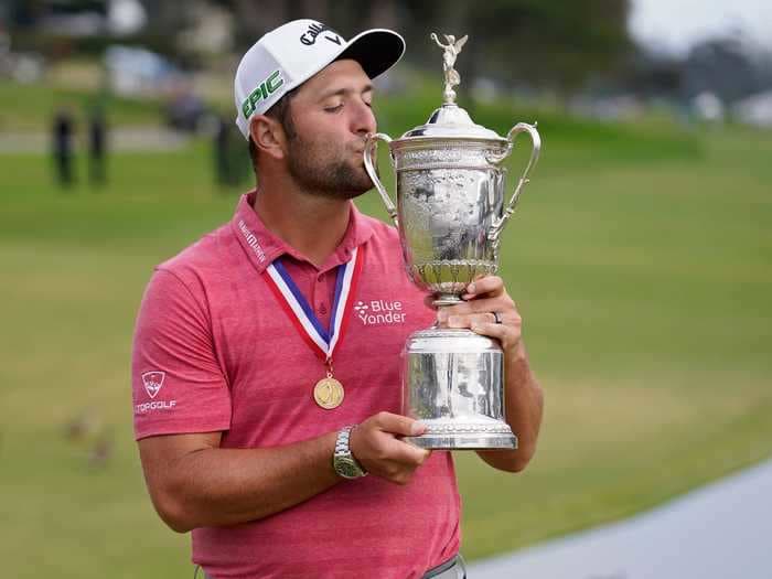 Jon Rahm celebrated his US Open victory by chugging out of the trophy, blasting 'We Are the Champions,' and hitting glow-in-the-dark golf balls