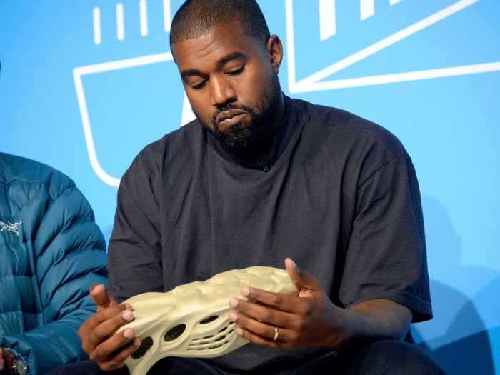 Kanye West is suing Walmart over 'virtually indistinguishable' knockoffs of his foam Yeezy shoes