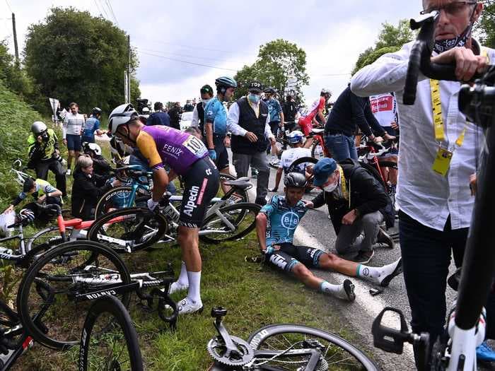 The spectator who caused an enormous crash at the Tour de France could face a year in prison and an $18,000 fine