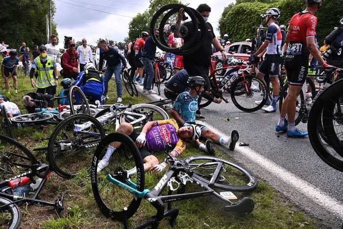 A doctor who dealt with the Tour de France's horror crash said it was like a 'war zone' when he arrived on the scene