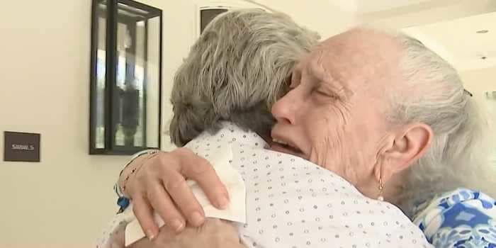 A video shows an 88-year-old resident of the collapsed Surfside condo being reunited with the man who saved her