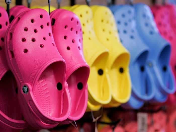 Crocs sues Walmart, Hobby Lobby, and 19 others, claiming they sold copycat versions of its $50 signature clogs