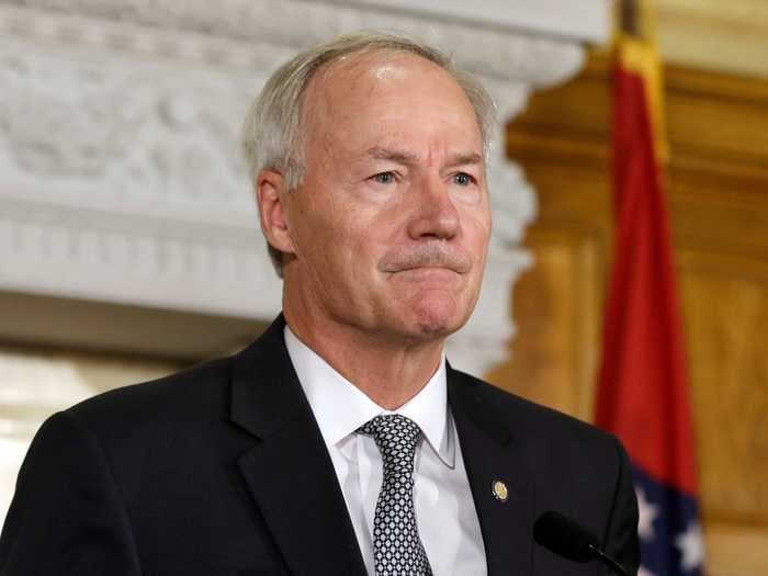 The GOP governor of Arkansas, where vaccines are lagging and COVID-19 is surging, said it's 'disappointing' vaccines are 'political'