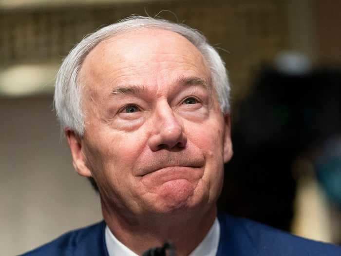 Arkansas GOP governor who is holding town halls to urge vaccinations said people he meets have called the shot a 'bioweapon' and talked about 'mind control'