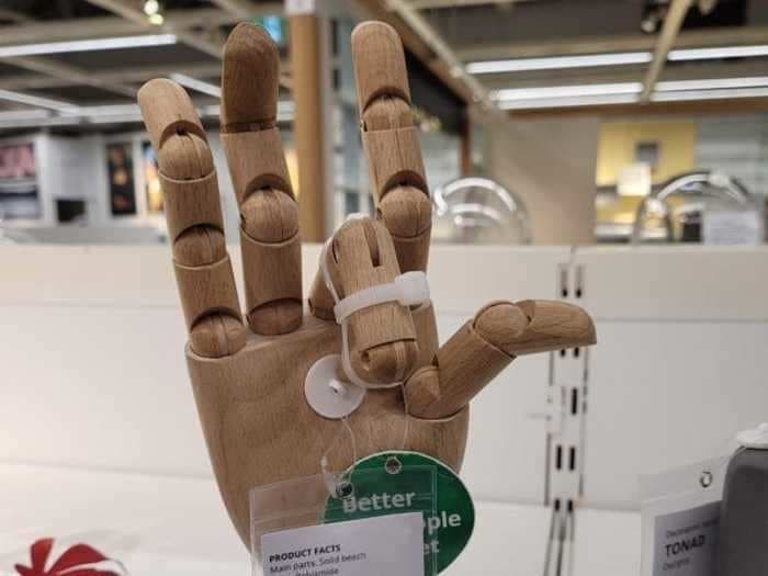 Ikea shoppers keep making the wooden model hands flip people off, so one store zip-tied the middle finger down