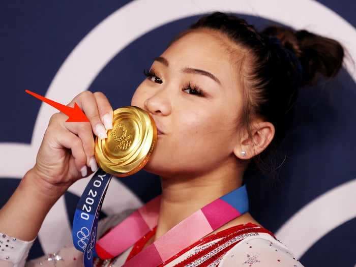 Suni Lee says her square-tip nails aren't just for looks - they help her grip the uneven bars