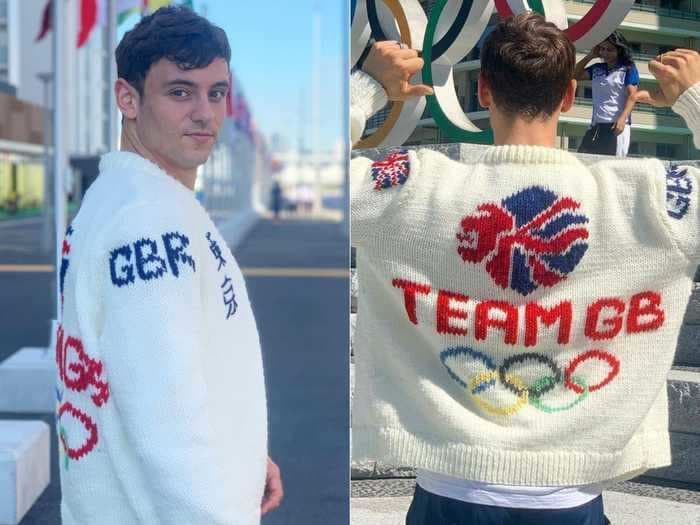 Tom Daley shows off his finished cardigan after delighting fans by knitting in the stands at the Olympics