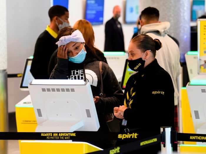 Spirit is offering double pay to flight attendants amid the 'perfect storm' that's led to hundreds of flight cancellations