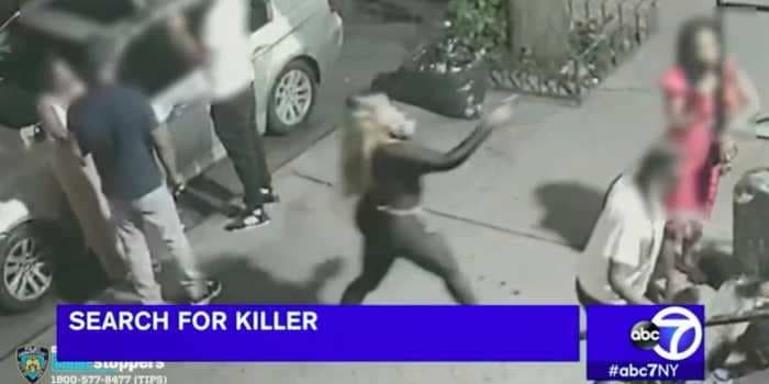 Surveillance footage shows a woman casually walk up to another woman on a busy New York street and shoot her point blank