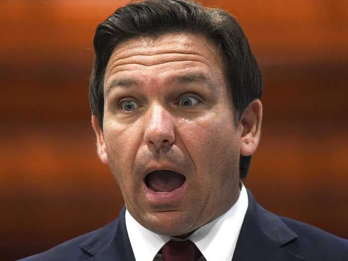 Gov. Ron DeSantis is waging a war on school mask mandates - and is threatening to withhold paychecks of school-board members who defy his mask ban