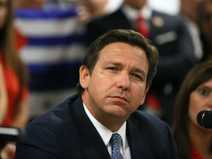 A Florida school board member says Gov. Ron DeSantis is 'the mad king of the COVID era' and is causing 'panic' and 'chaos' in her district