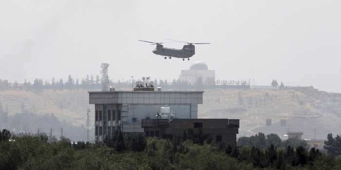 Helicopters are evacuating staff from the US embassy in Kabul as the Taliban enter the Afghan capital 'from all sides'