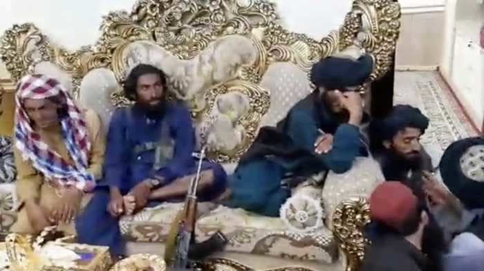 Videos show Taliban fighters capture the opulent palace of a US-allied warlord, ransacking property and drinking from gold tea set