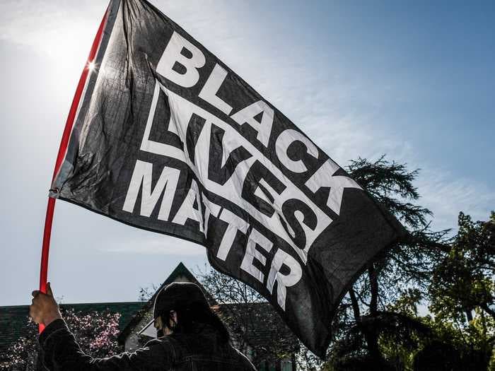 Florida school district will pay $300,000 to teacher who was removed from classroom after displaying Black Lives Matter flag