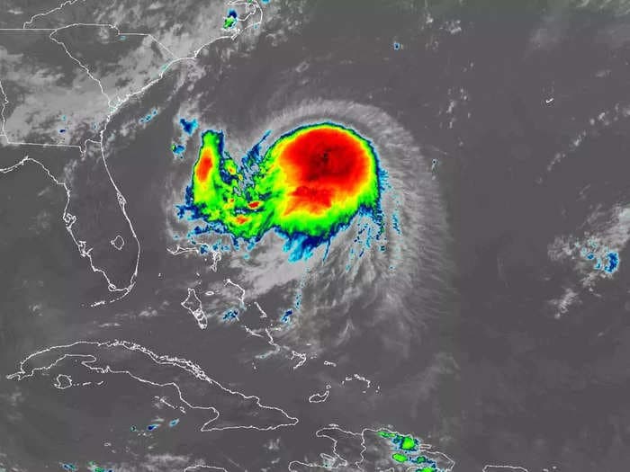 Henri, downgraded to a tropical depression after making landfall, is moving across New England