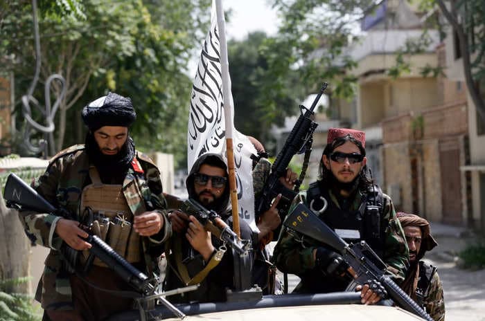 Armed Afghans push out Taliban from 3 districts in first local assault against the militant group, according to reports