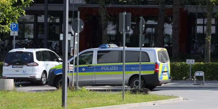 Half a dozen students at a German university had their limbs turn blue and police think someone may have poisoned a campus kitchen