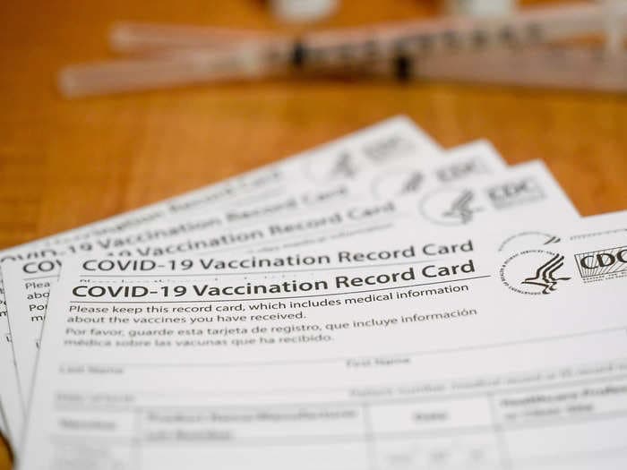 Manhattan prosecutors charge 13 people, including healthcare workers, with buying fake COVID vaccine cards from 'AntiVaxMomma' Instagram