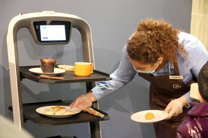 An understaffed Dallas restaurant is renting robots for $15 a day to welcome guests and take food to tables