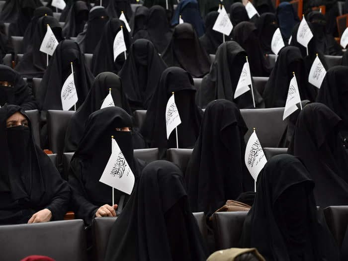 Striking photos show black-clad veiled Afghan women attending a pro-Taliban rally in Kabul