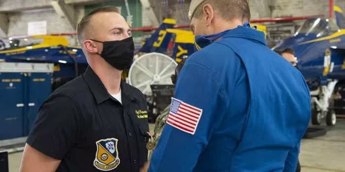 A Marine with the Blue Angels received a top award for acts of heroism after saving the lives of 3 children
