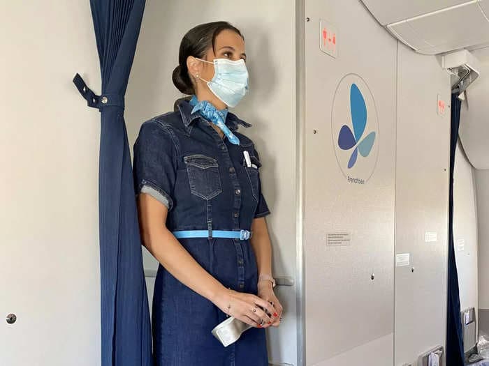 More international airlines are banning cloth masks on flights in favor of medical and surgical masks
