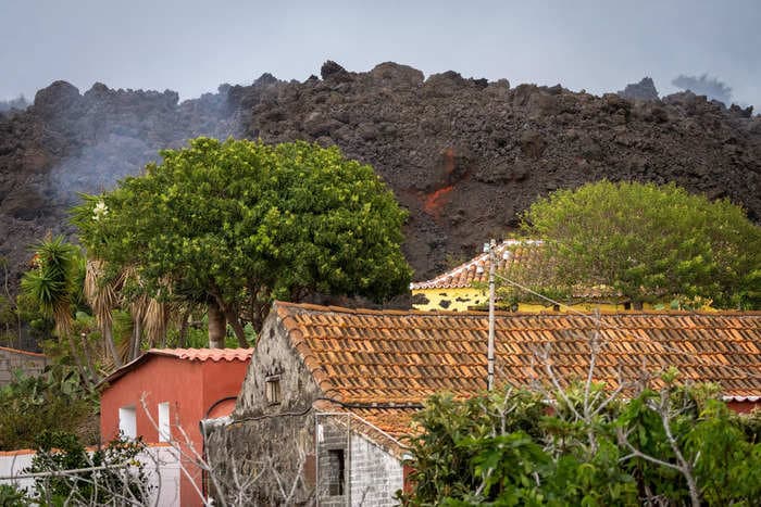 Unbelievable videos show a 40-foot wall of lava engulfing homes on La Palma in the Canary Islands