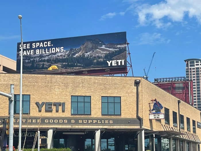 Cooler giant Yeti took a playful swipe at Elon Musk and Jeff Bezos' space race with a billboard urging the billionaires to explore earth and 'save billions'
